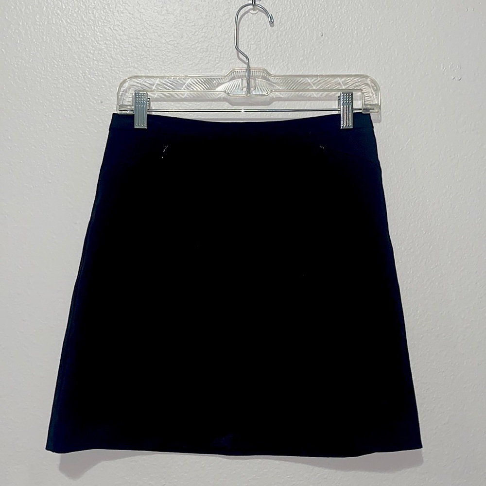Simple black mid length skirt